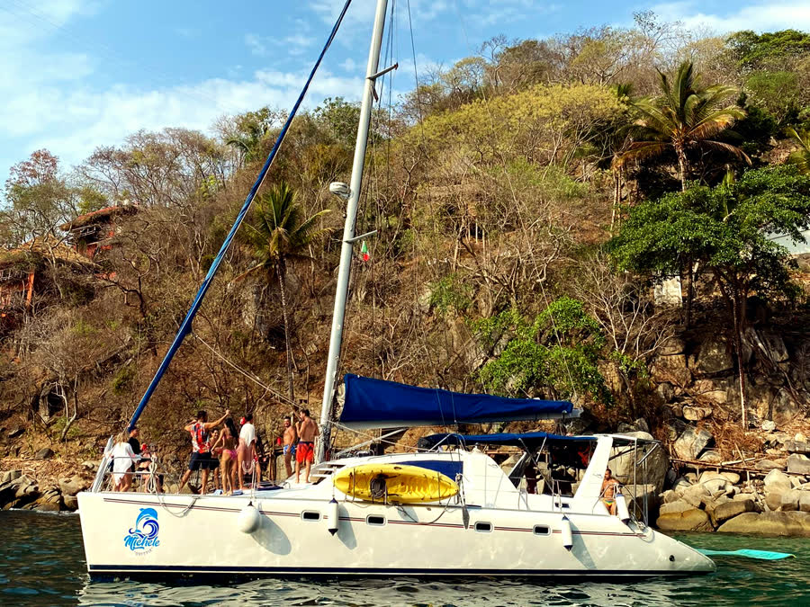 The catamaran anchored in a cove near Puerto Vallarta